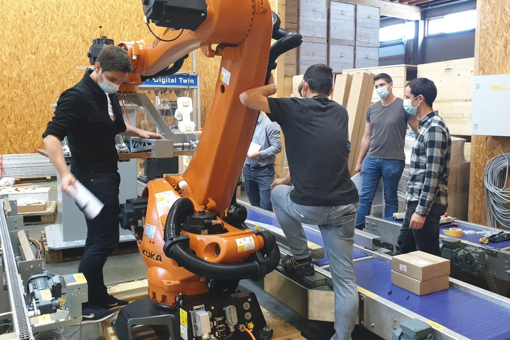 Customers inspecting individual sub-assemblies of their machine in the assembly hall